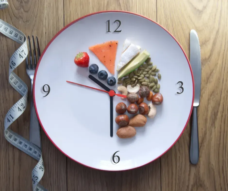 Plate with clock markings and covered with food between 10:00 AM and 6:00 PM