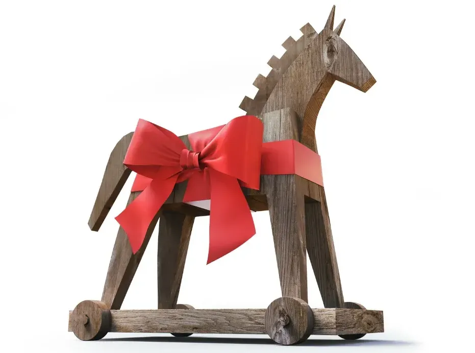 Wooden Trojan horse with a red bow tied around it