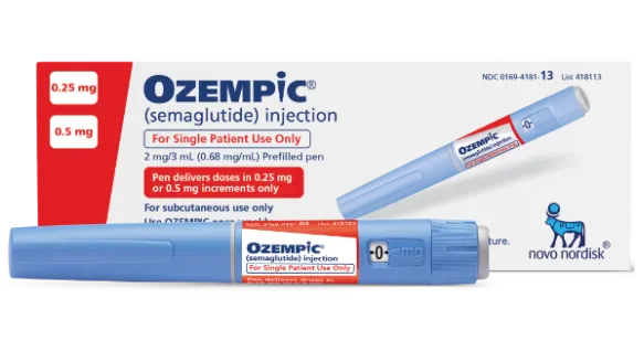 Ozempic box with injection pen lying in front