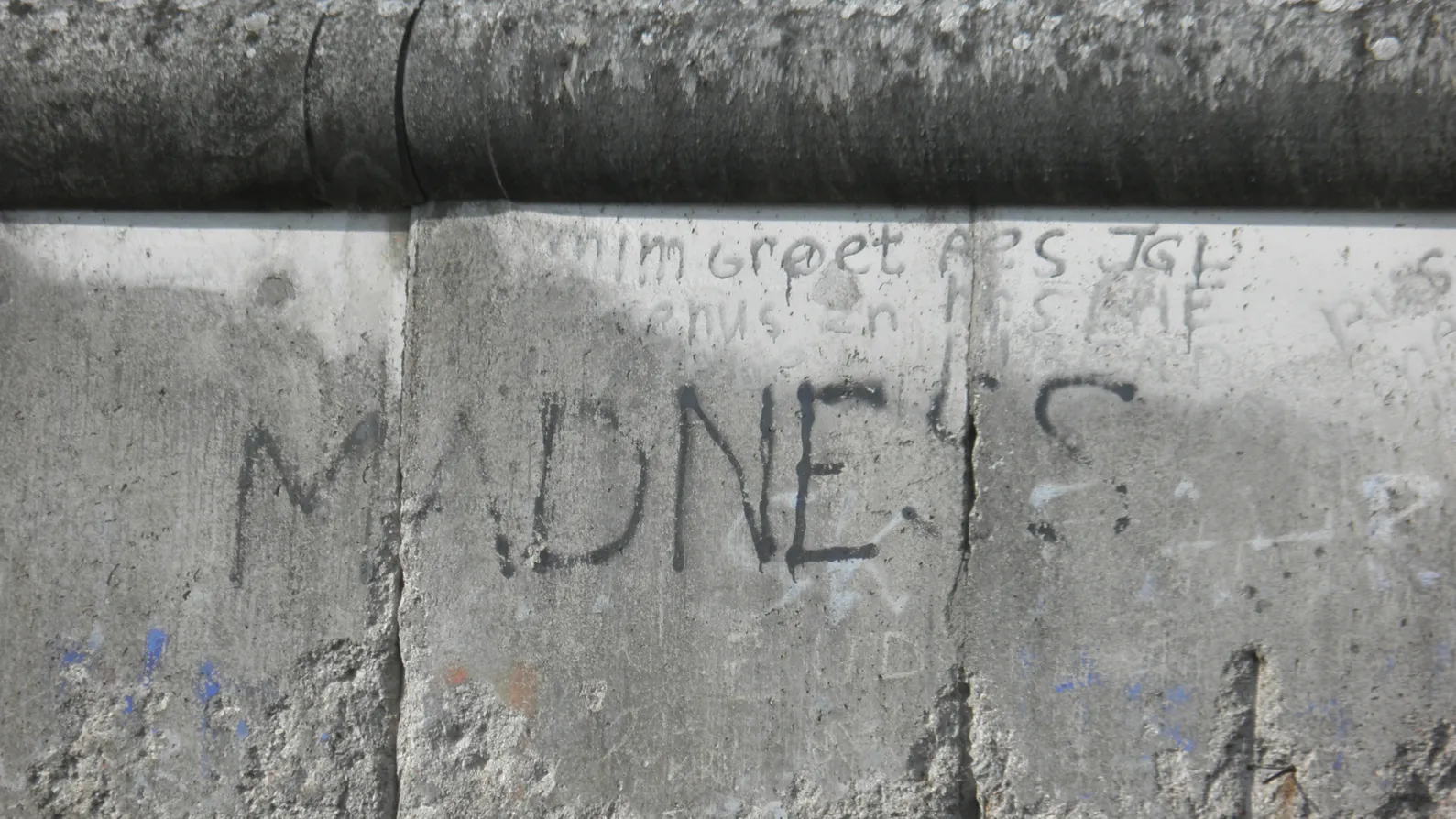 Stones covered with graffiti: MADNESS