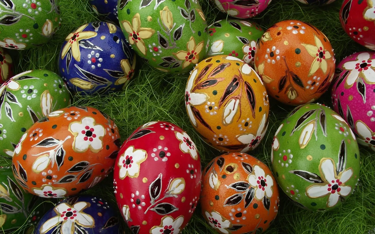 Traditional hand-painted Hungarian Easter eggs in a grass-lined basket